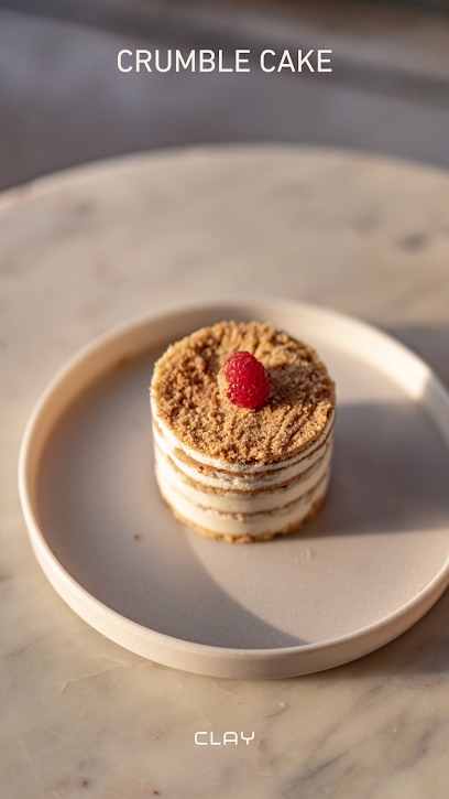 المكتب الرئيسي لمقهى المخاطر والطين -