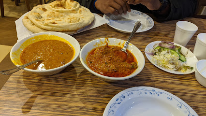 مطعم دلهي نيهاري - برج الساعة - أبو ظبي - +971 6 562 5114