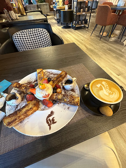 مقهى M14 - United Arab Emirates|Seih Al Uraibi - Ras al Khaimah|Sheikh Humaid Al Mohammad Al Qasimi Rd|New Mall