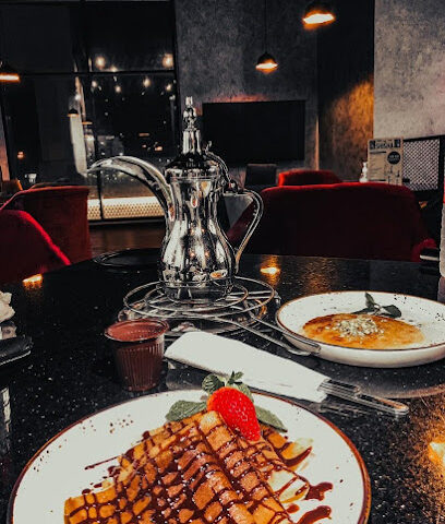 مطعم كافيه X 2oz - أبو ظبي - +971 6 886 8808