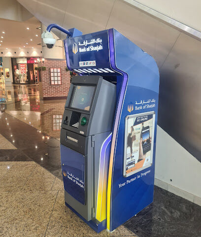 جهاز الصراف الآلي لبنك الشارقة - أبو ظبي -