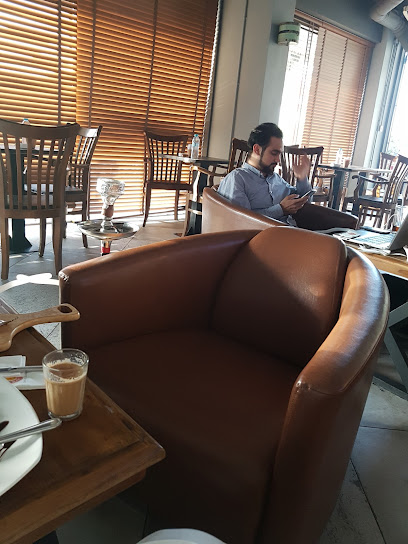 مقهى تي جنكشن - عجمان - United Arab Emirates|Al Owan - Al Nakhil 2 - Ajman|Corniche St