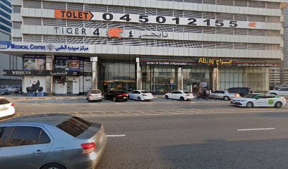 صراف آلي تابع لبنك الإمارات دبي الوطني - أبو ظبي -